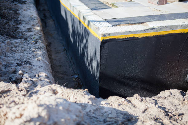 Professional Basement Waterproofing technician working in McMinnville, TN